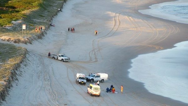 Emergency services personnel gather at South Ballina beach