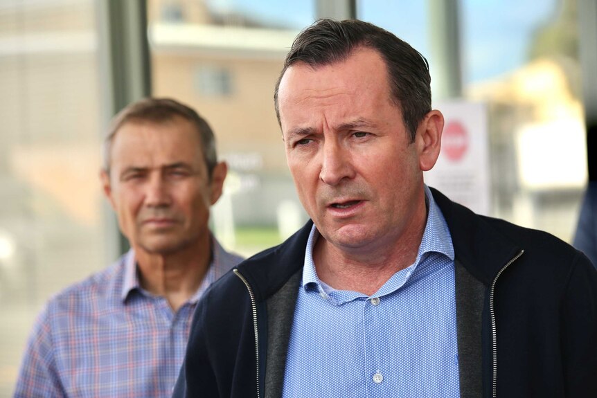 Premier Mark McGowan outside his Rockingham office with an expression on his face of sad acceptance.