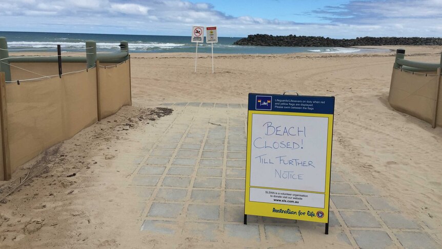 Shark attack closes beach