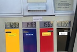 A petrol pump showing the prices of fuel