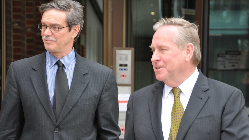 WA Premier Colin Barnett and then-energy minister Mike Nahan walking side by side.