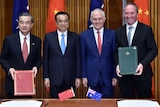 Chinese Minister for Foreign Affairs Wang Yi, Chinese Premier Li Keqiang, Malcolm Turnbull and Barnaby Joyce.