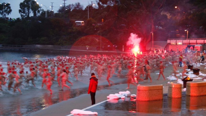 Nude swimmers at Dark Mofo annual swim