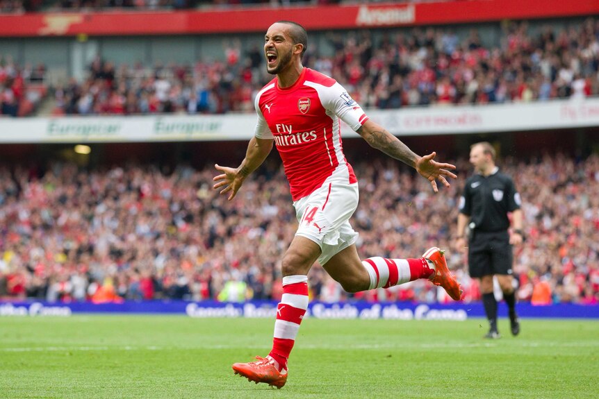 Theo Walcott celebrates goal against West Brom