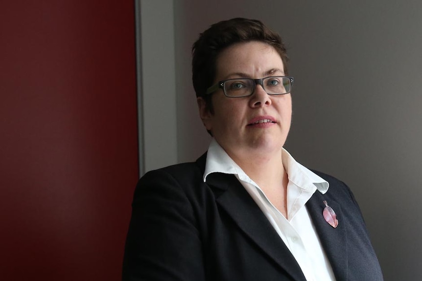 Fiona McLay, the lawyer for Breanna, stands next to a window.