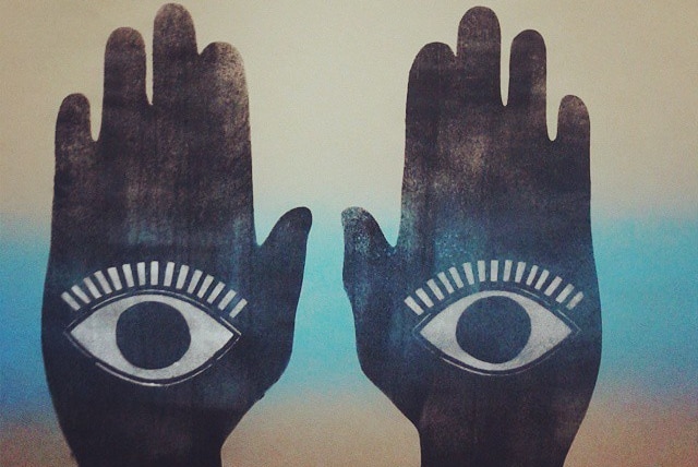 artwork showing two hands with eyes in them