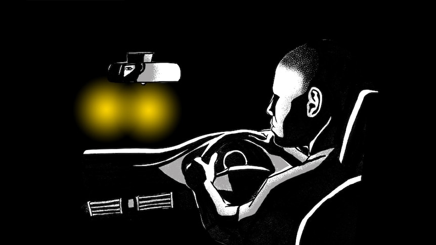 Dark illustration of man looking in review mirror of car. Yellow headlights shining through front windscreen.