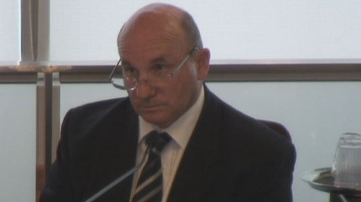 TV still of Toowoomba Catholic Education director John Borserio at Royal Commission into sex abuse in Brisbane. Friday Feb 21, 2014