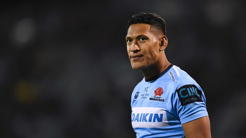 A rugby union player looks stony-faced during a Super Rugby game.