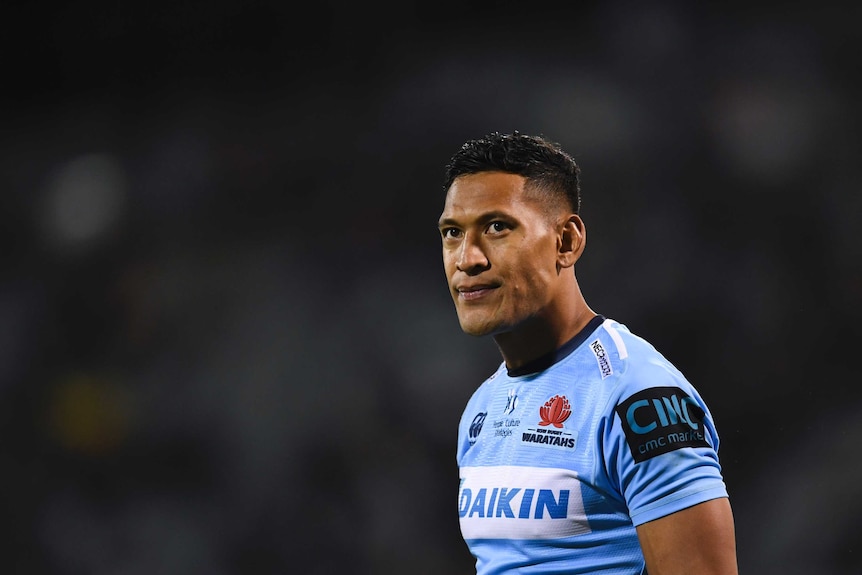 A rugby union player looks stony-faced during a Super Rugby game.