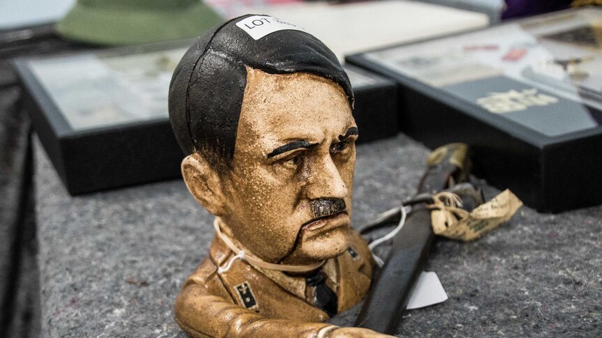 A small figurine of German dictator Adolf Hitler.