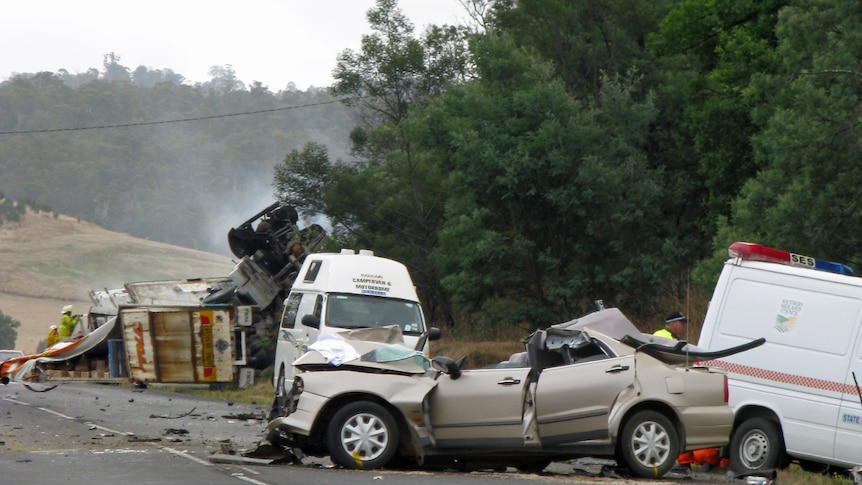 A semi-trailer caught fire killing the driver after a crash north of Hobart