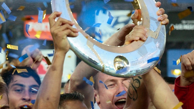 Newcastle Jets skipper Jade North holds the trophy