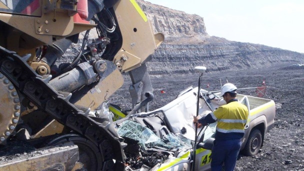 A light vehicle crushed by a dozer at the Hunter Valley's Mt Arthur mine site October 2013.