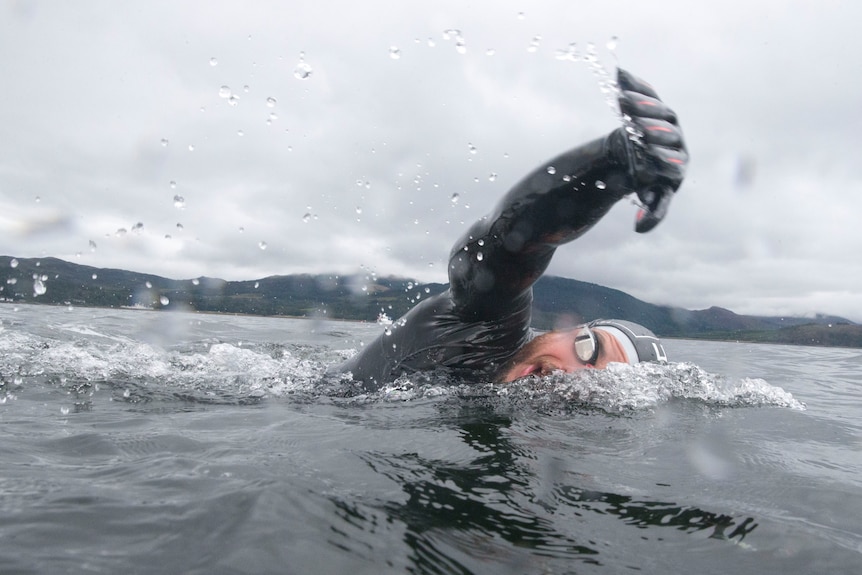 Freezing waters off the coast of Scotland proved no barrier to Ross Edgley becoming the first person to swim round Great Britain