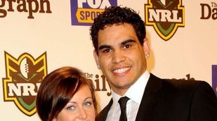 Melbourne Storm player Greg Inglis, right, smiles for the cameras with girlfriend Sally Robinson
