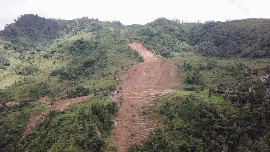 Devastation caused by the landslide is seen on side of mountain