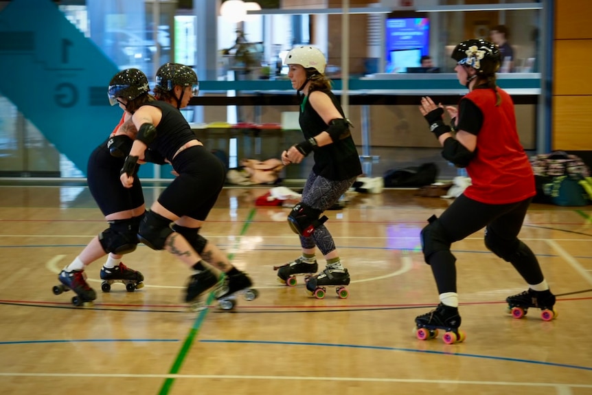 Teammates collide at Adelaide training for the national roller derby titles