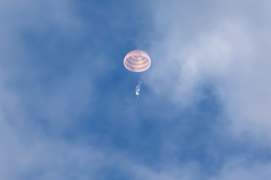 A space capsule in the sky.