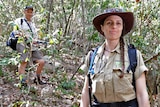 Snake researcher Christina Zdenek and herpetologist Chris Hay stand in the bush on Magnetic Island