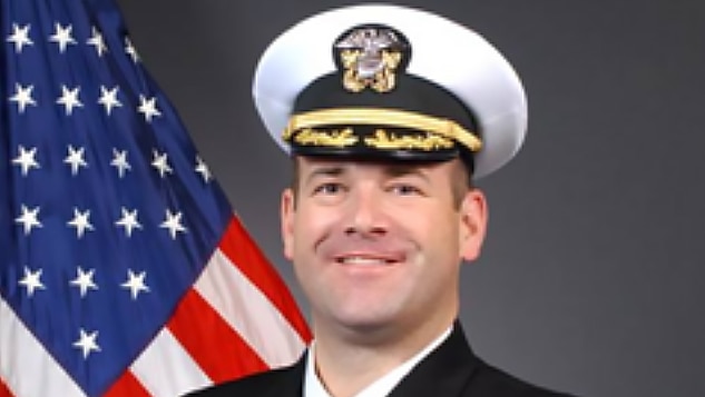 Official photo of a Naval officer in uniform.