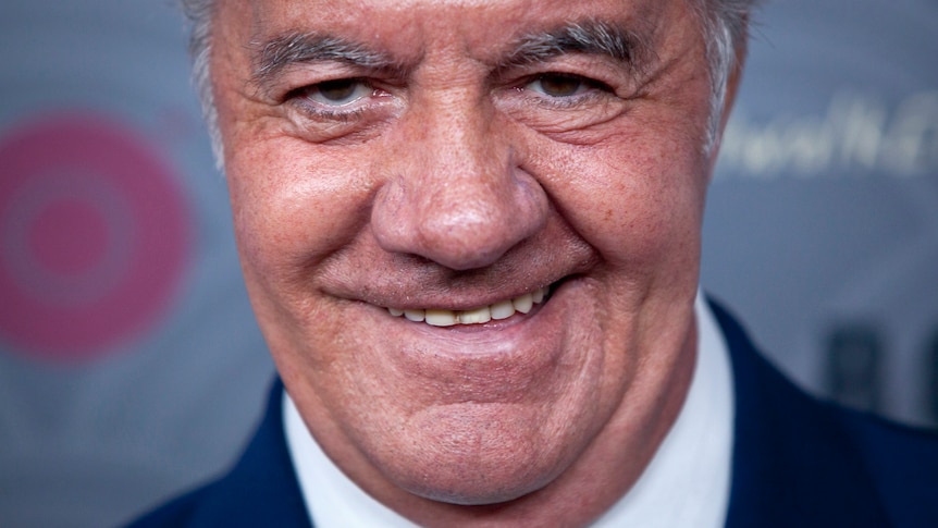 Tony Sirico smiles at the camera