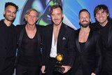 Best Dance Recording winners RÜFÜS DU SOL, mixer Cassian and co-writer Jason Evigan at the 64th annual Grammy Awards