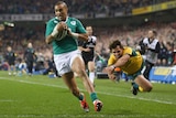 Ireland's Simon Zebo scores against Australia at Lansdowne Road in Dublin on November 22, 2014.