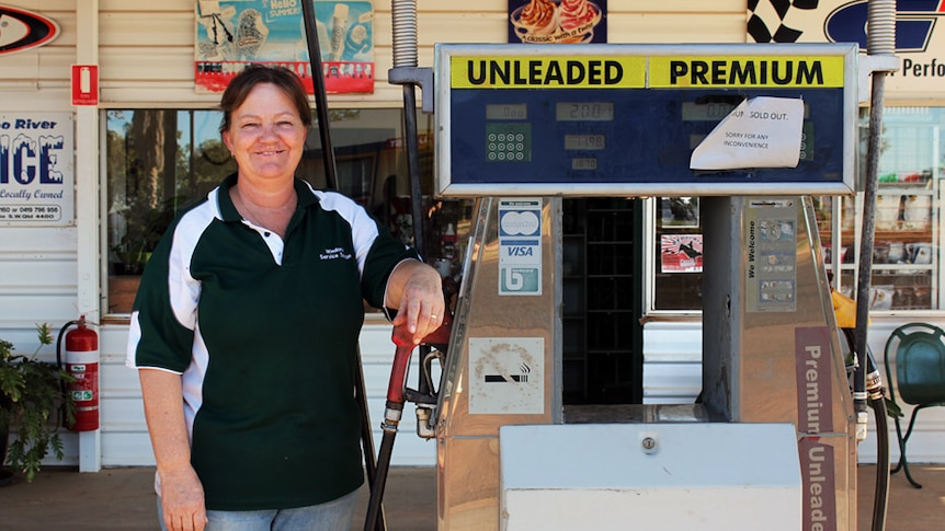 Danielle Weston standing out the front of her petrol station in Windorah.