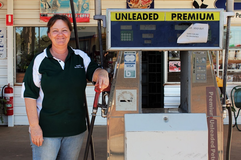 Danielle Weston standing out the front of her petrol station in Windorah.