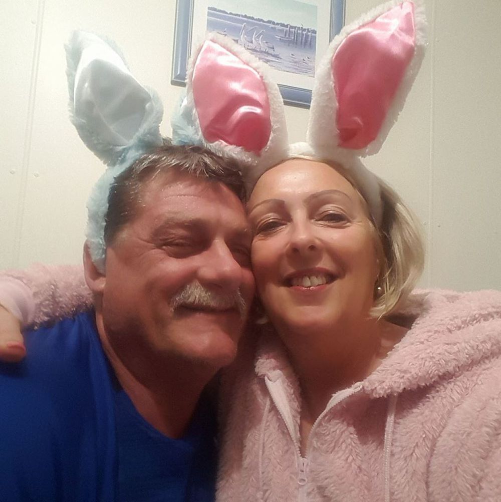 Gregory Roser and Sharon Graham wearing bunny ears. 