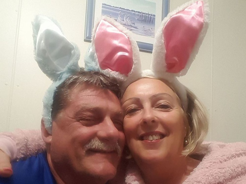 Gregory Roser and Sharon Graham wearing bunny ears. 