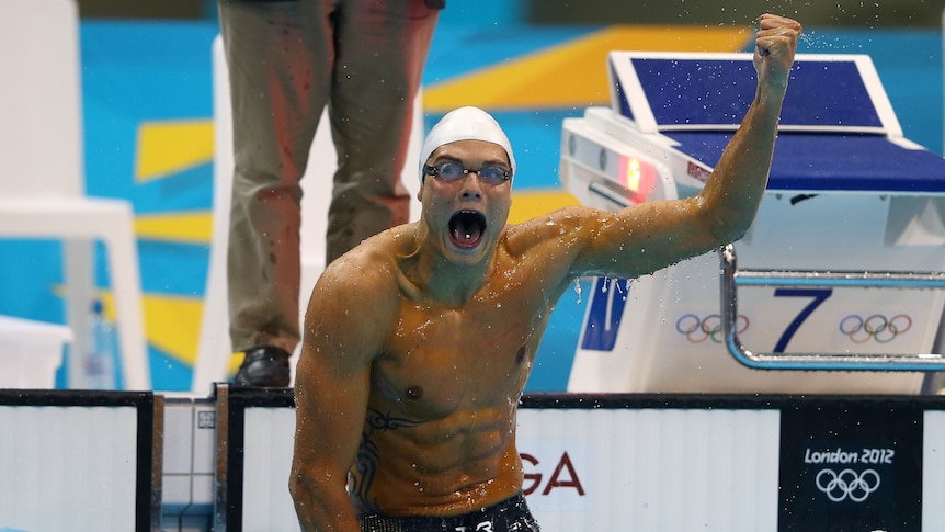 Sprint king ... Florent Manaudou celebrates after winning the 50m freestyle final.