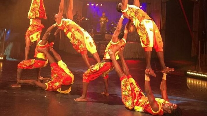 Cirque Africa acrobats performing feats of balance and strength.