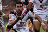 The Warriors' Konrad Hurrell blows a kiss to fans after scoring a try against the Broncos.