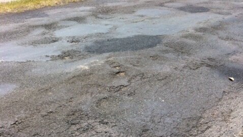 Potholed country road in Dungog, New South Wales, good generic