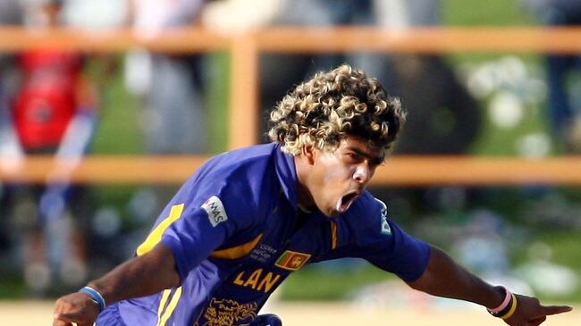 Sri Lankan bowler Lasith Malinga reacts to taking his fourth wicket from four consecutve balls.