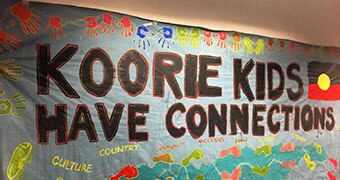 Close-up of banner reading 'Koorie Kids Have Connections'