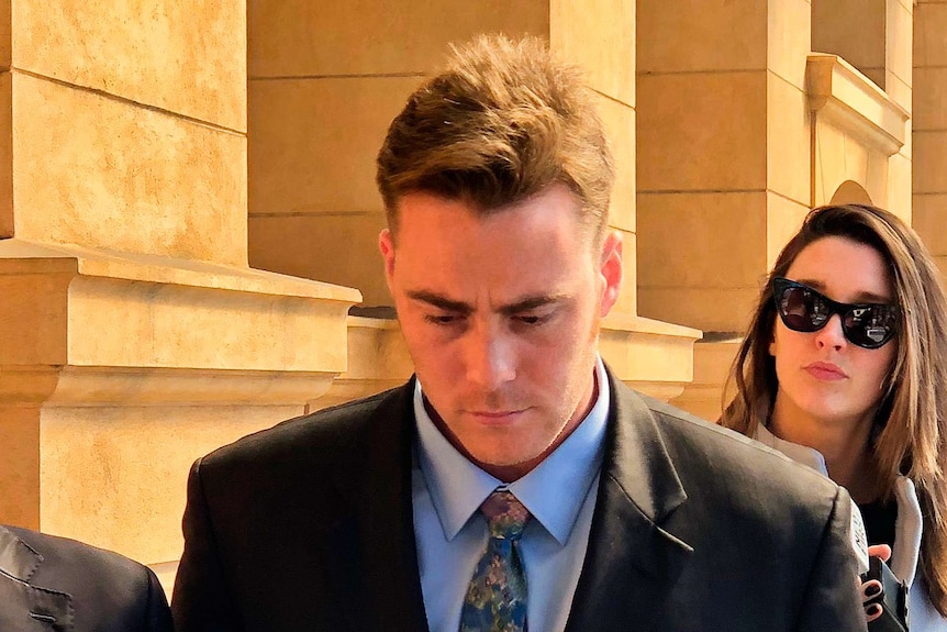 baseballer Tim Cusick outside court