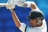 Ed Cowan drives for Tasmania