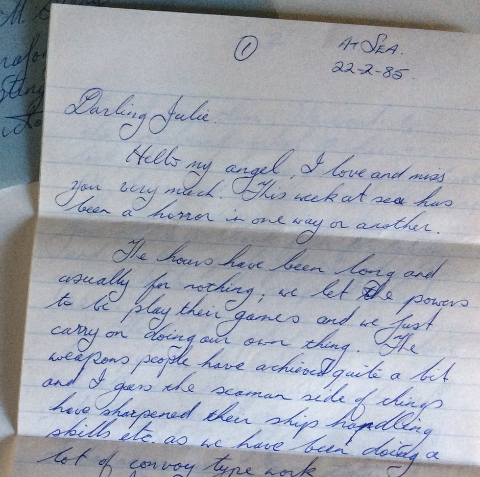 A handwritten letter which starts "Darling Julie, Hello my angel, I love and miss you very much".