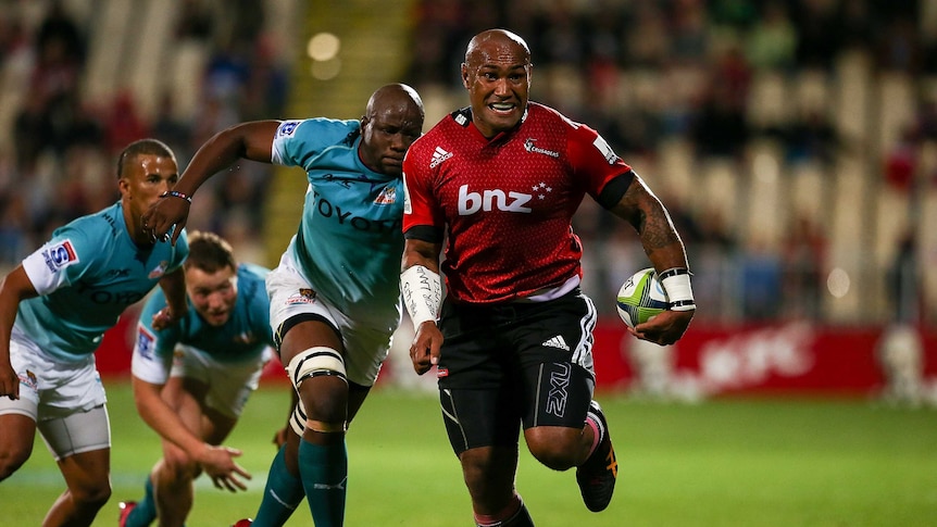 On the burst ... Nemani Nadolo makes a break for Crusaders against the Cheetahs