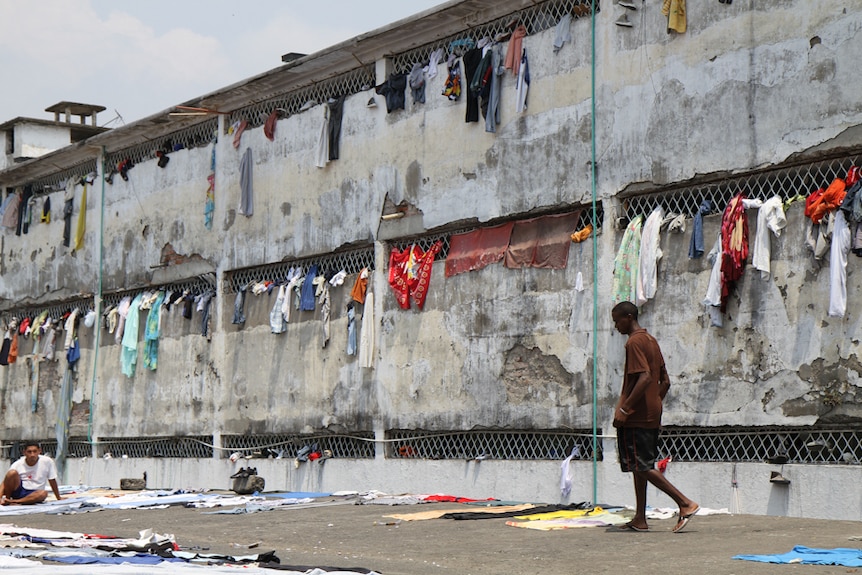 An inmate walks on the roof of one of Colombia's most crowded prisons.