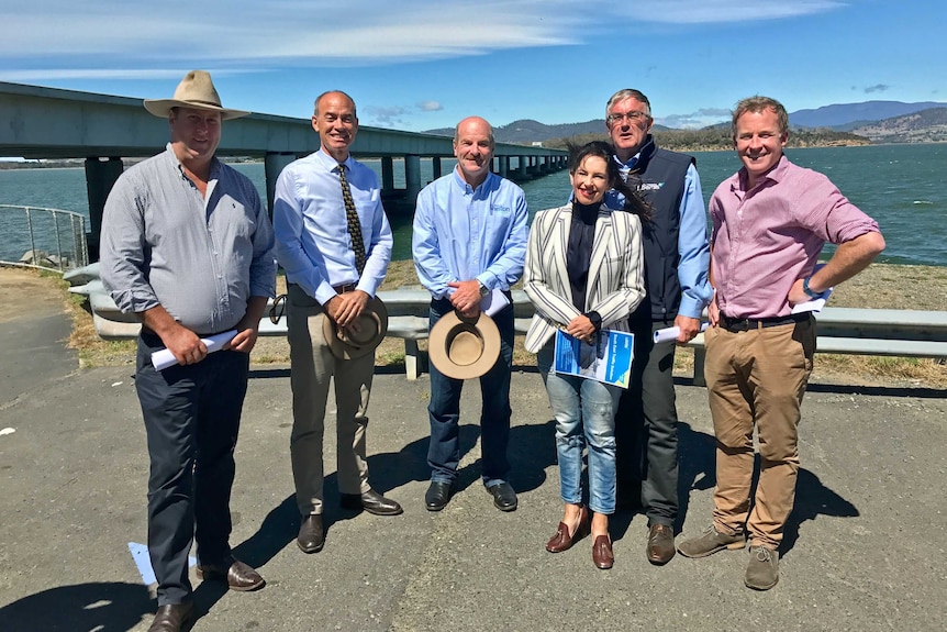 Tasmanian Premier Will Hodgman (r) with the candidates for Lyons.
