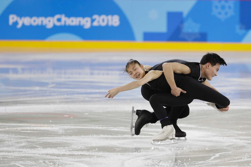 North Korean figure skaters Ryom Tae Ok (L) and Kim Ju Sik train for Pyeongchang Winter Olympics.