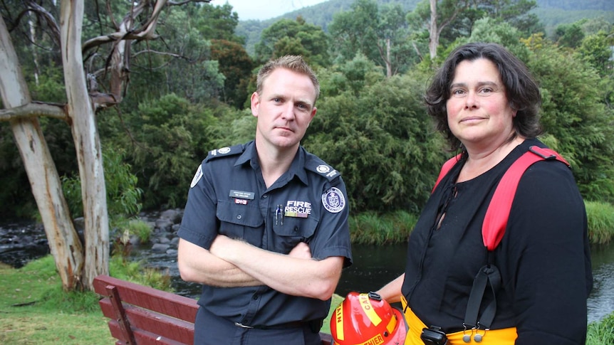 Tim Holland and Hazel Clothier stand in front of the creek in Warburton