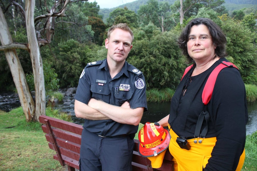 Tim Holland and Hazel Clothier stand in front of the creek in Warburton