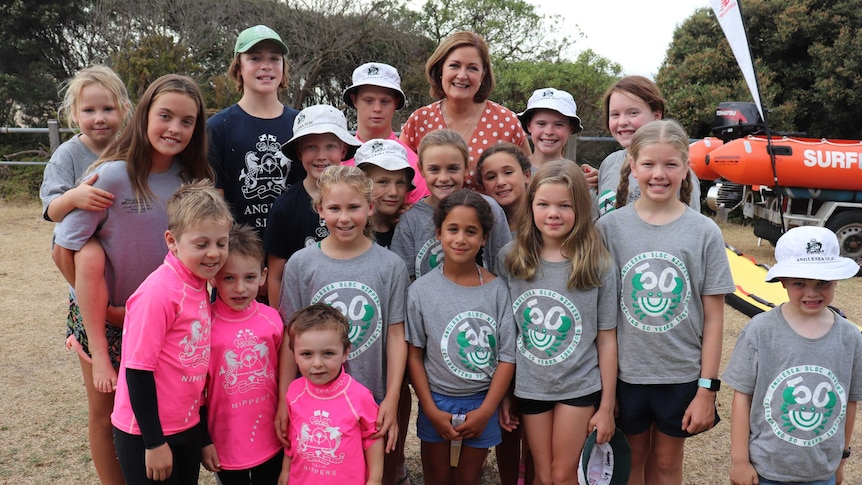 group of children of MP Sarah Henderson at the beach