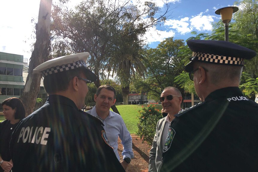 Michael Gunner and Jay Weatherill talk to police in Alice Springs