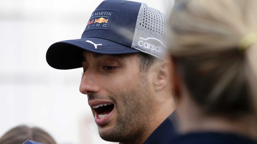 Red Bull driver Daniel Ricciardo answers journalist questions at the end of the Azerbaijan Formula One Grand Prix